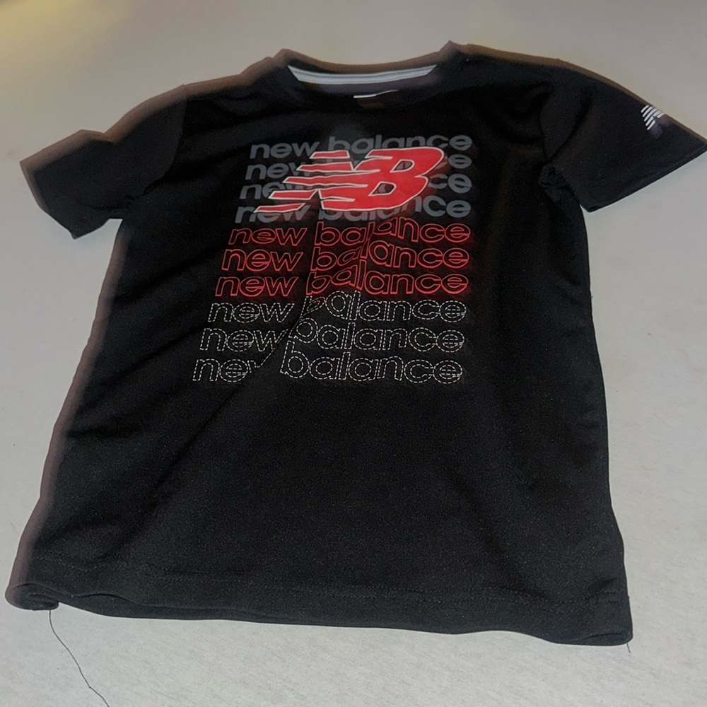 Kids Size 12 New Balance Rashguard Shirt.
